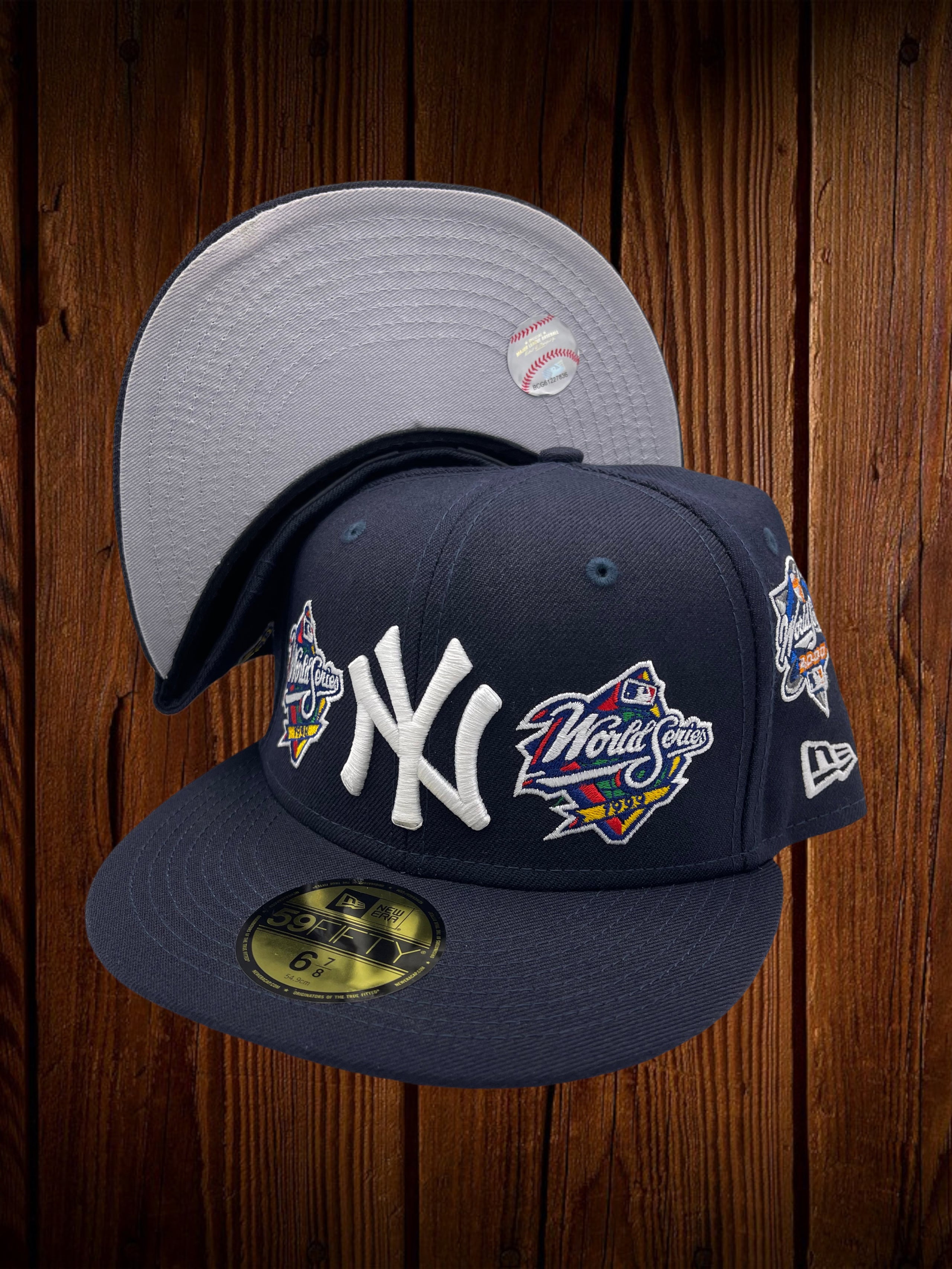 new-york-yankees-new-era-all-navy-with-world-series-patches-all-over
